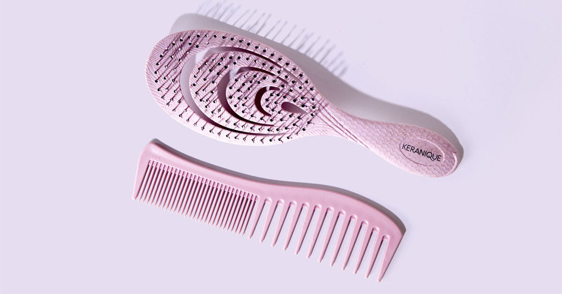 A comb and brush placed on a flat surface