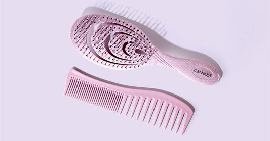 A comb and brush placed on a flat surface