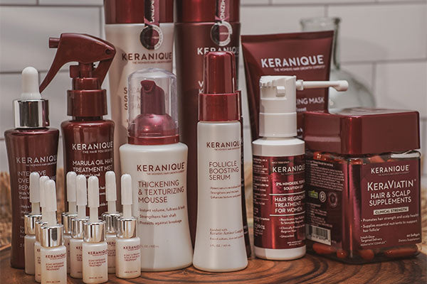 A collection of Keranique hair products