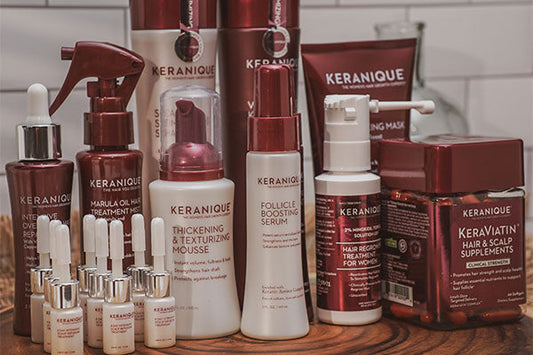 A collection of Keranique hair products