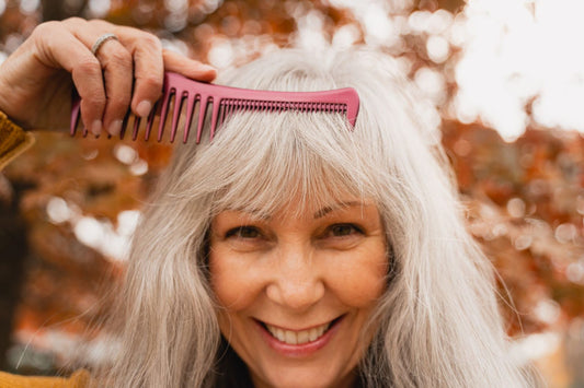 A woman brushing her hair 