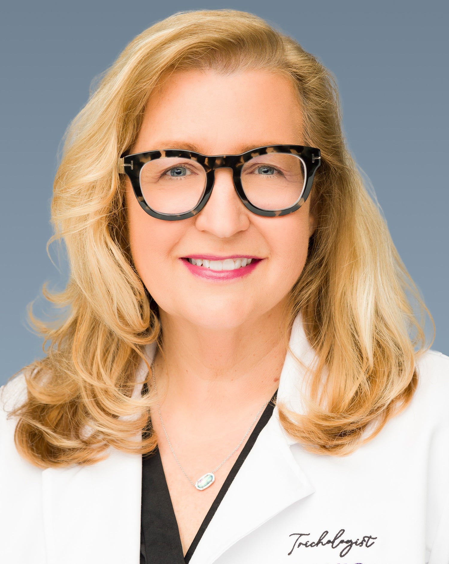 a headshot of Colleen Camp, licensed Trichologist and hair regrowth expert for Keranique